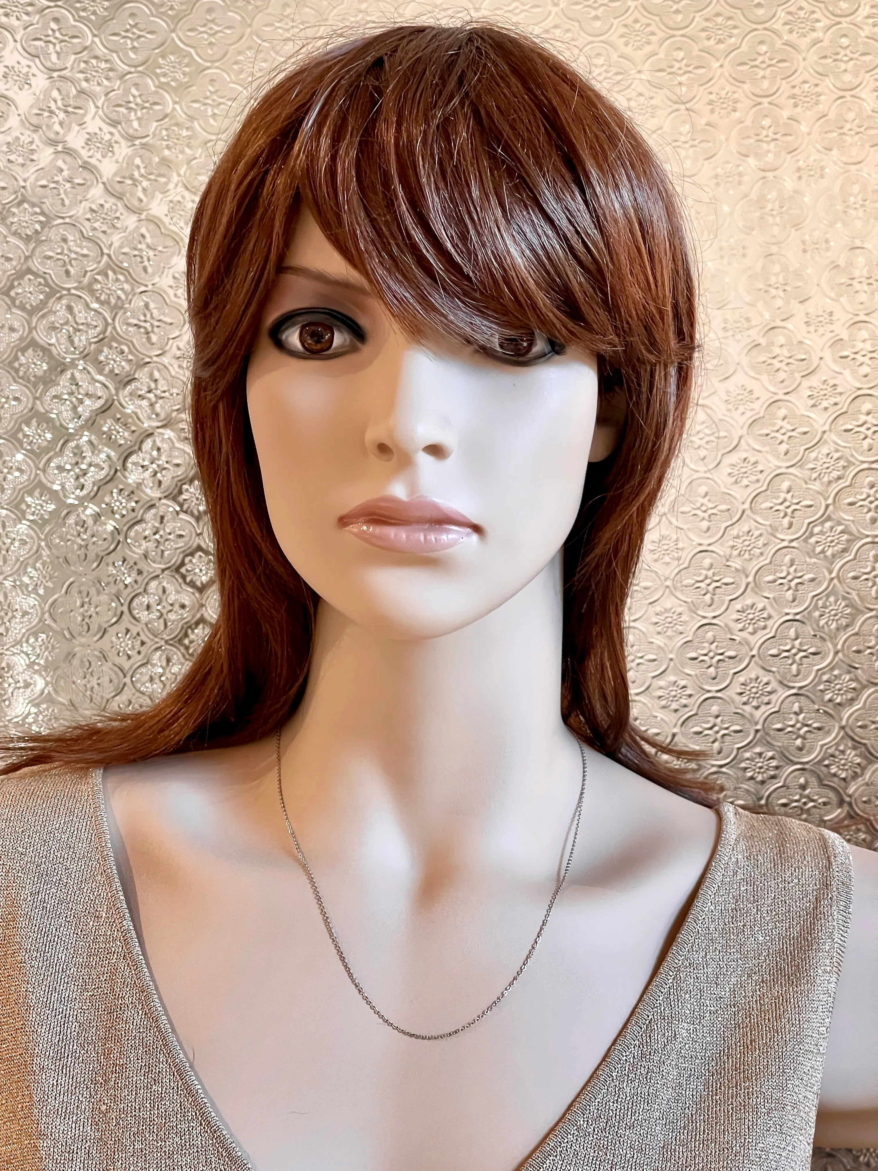 16, 18, and 20-inch slender Italian 925 sterling silver Diamond-Cut cable chain with spring ring clasp. Rhodium Plated.