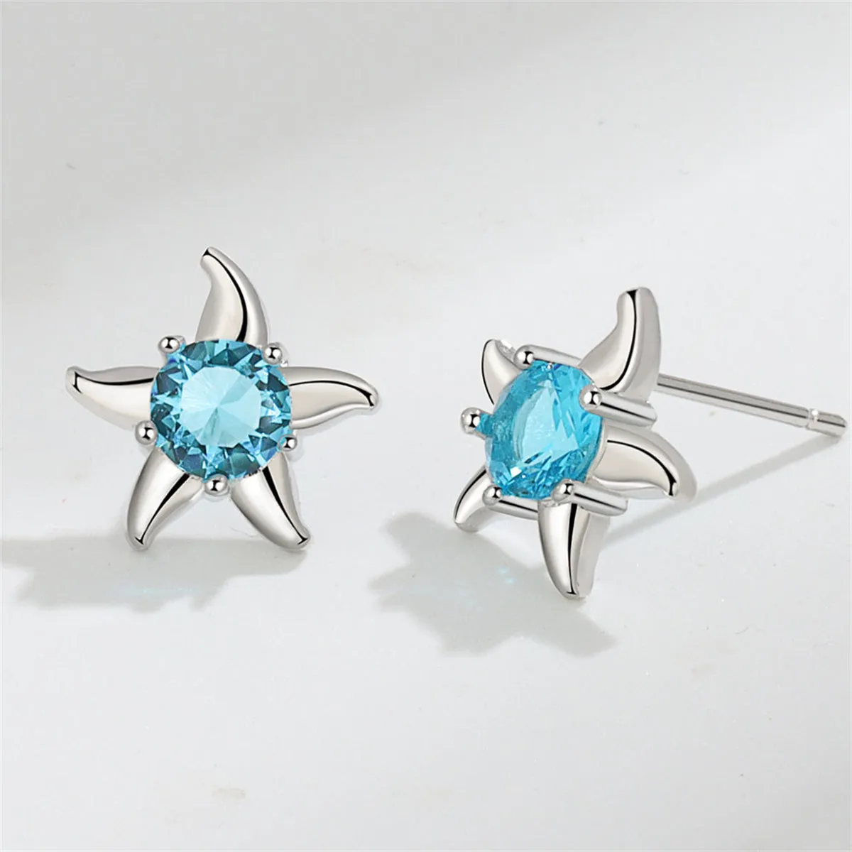 Blue Cubic Zirconia & Silver-Plated Starfish Stud Earrings