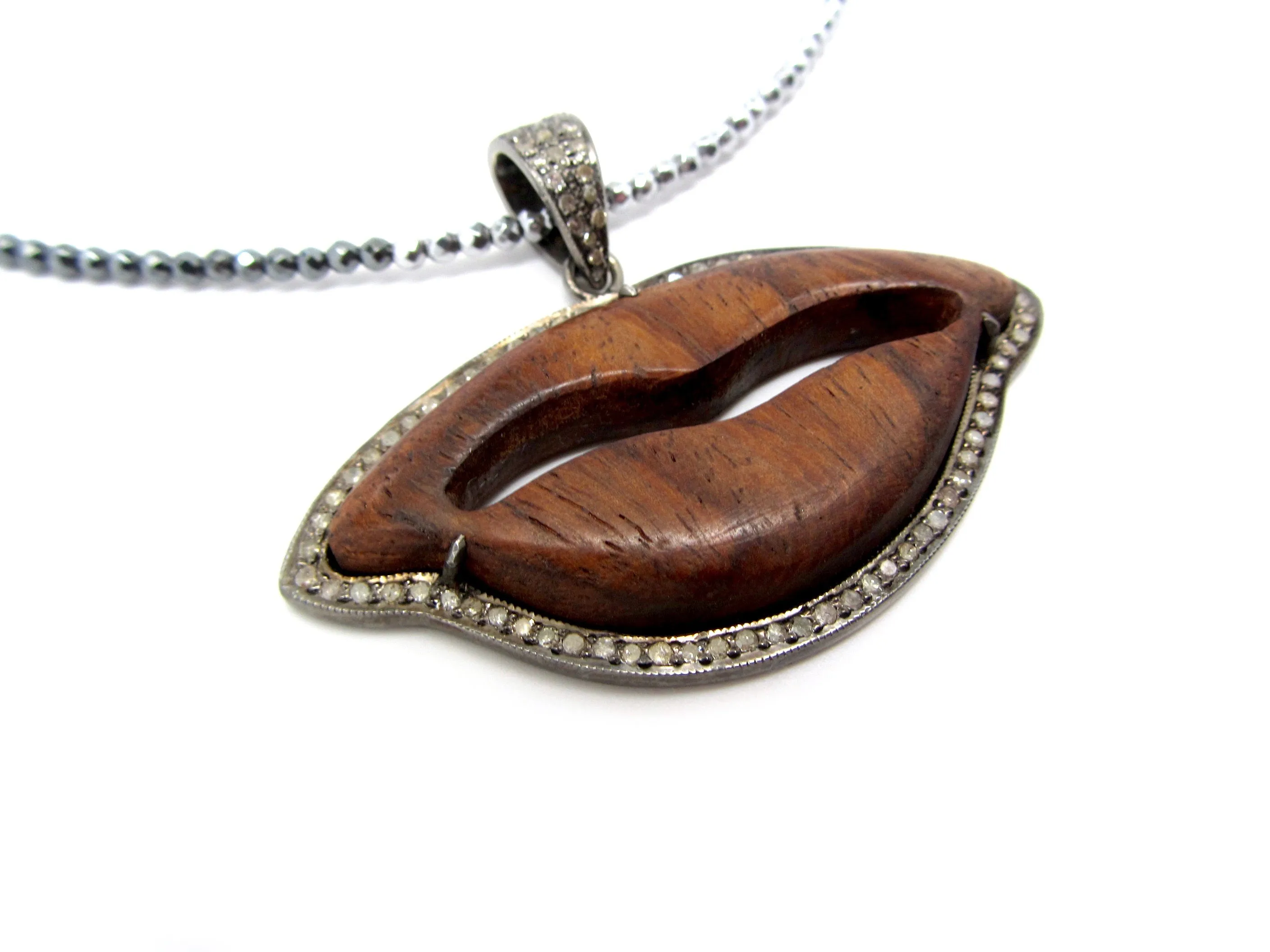 Diamond Wooden Lips Pendant on Tri-Color Hematite Necklace