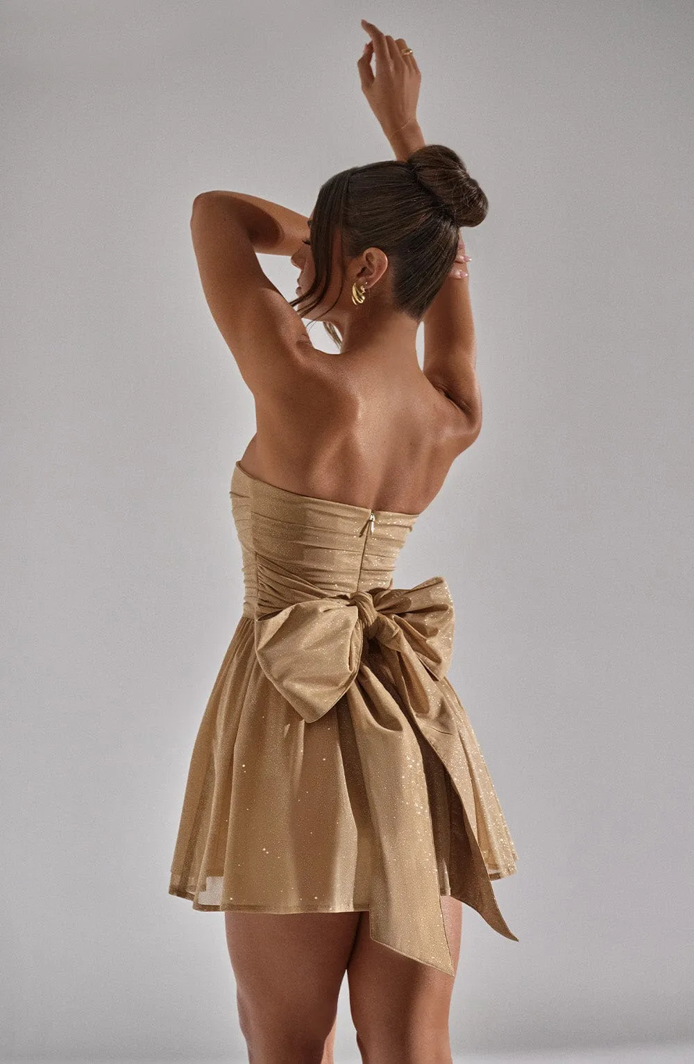 Rubí® | Strapless, sparkly dress with a button placket at the back