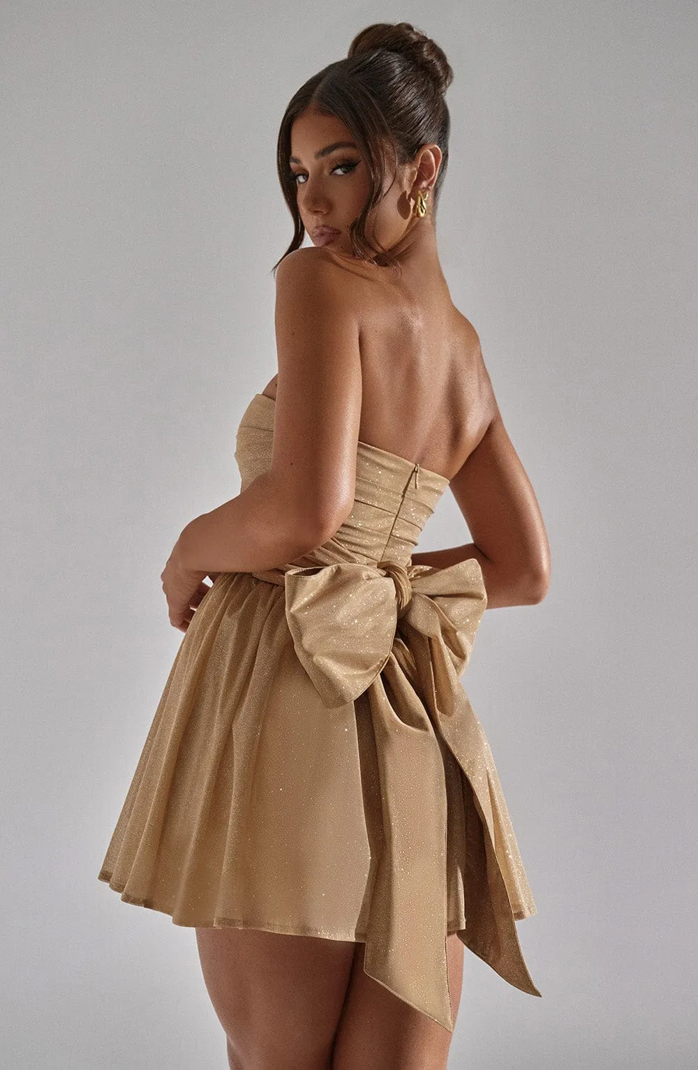 Rubí® | Strapless, sparkly dress with a button placket at the back