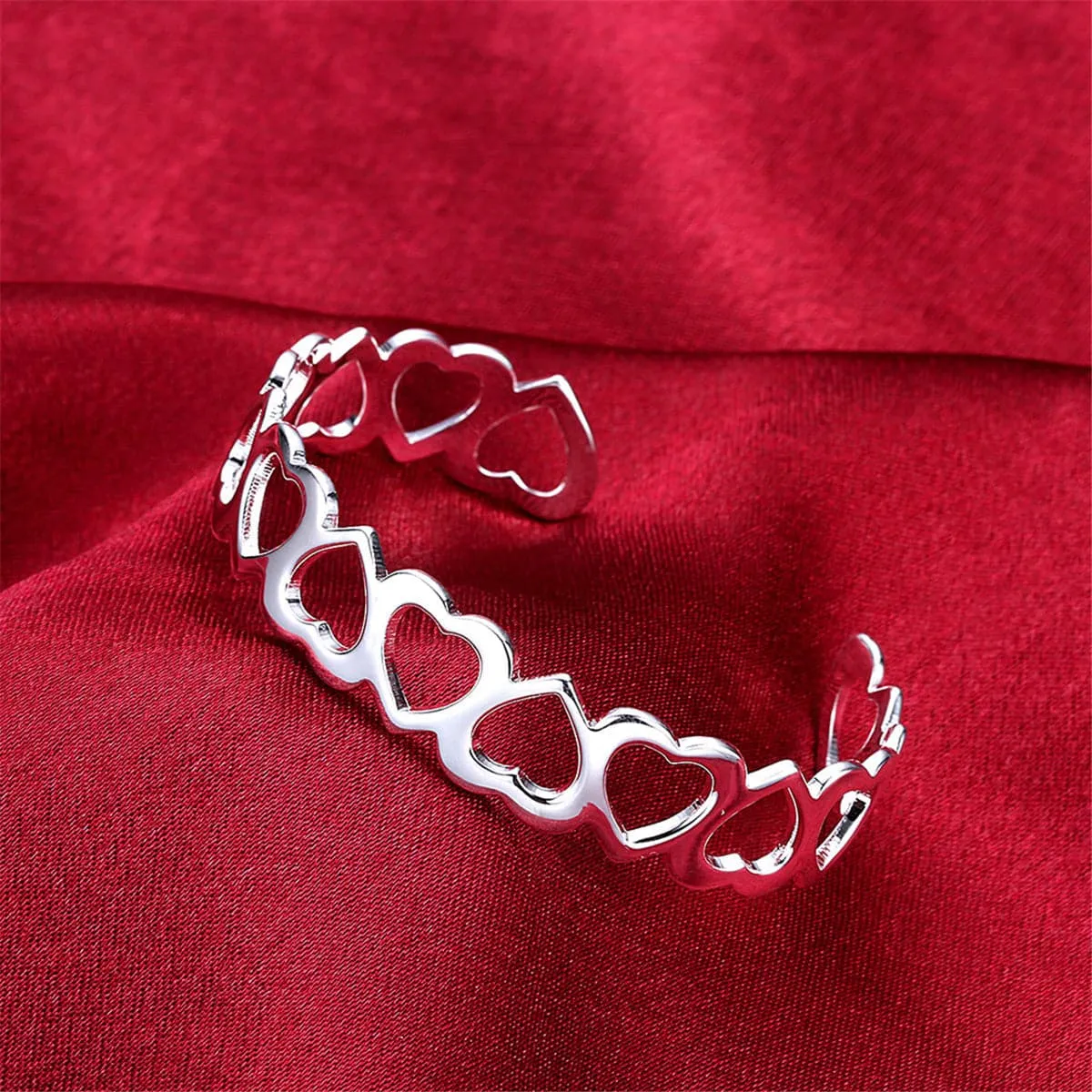 Silver-Plated Linking Hollow Heart Cuff