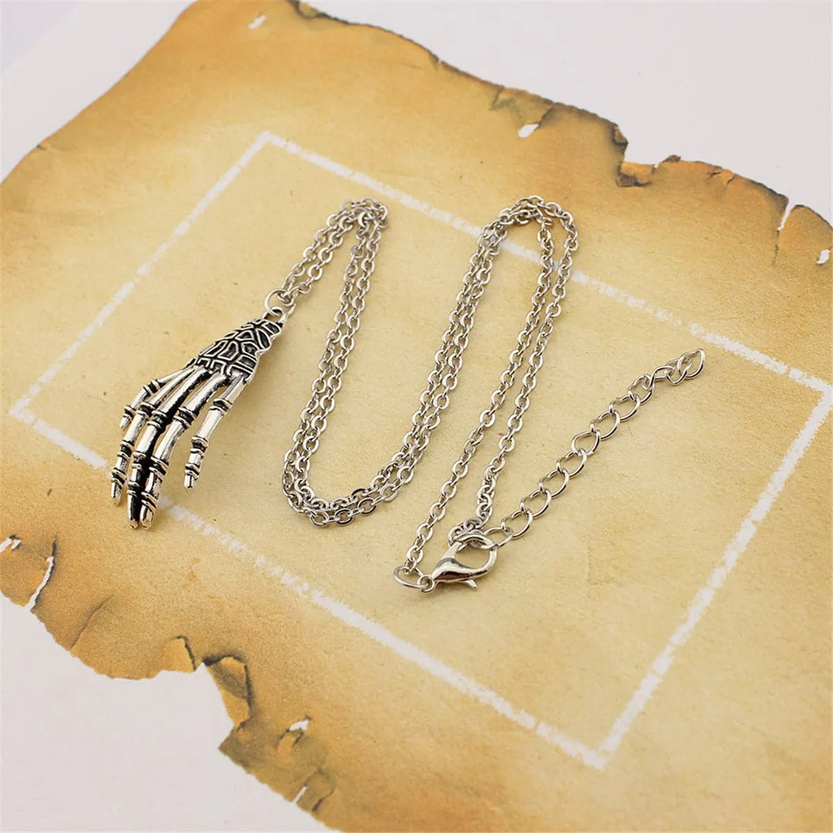 Silver-Plated Skeleton Hand Pendant Necklace