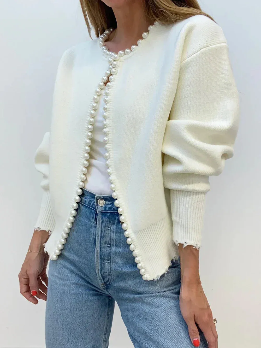 Urania® | Luxurious vest with parel edge