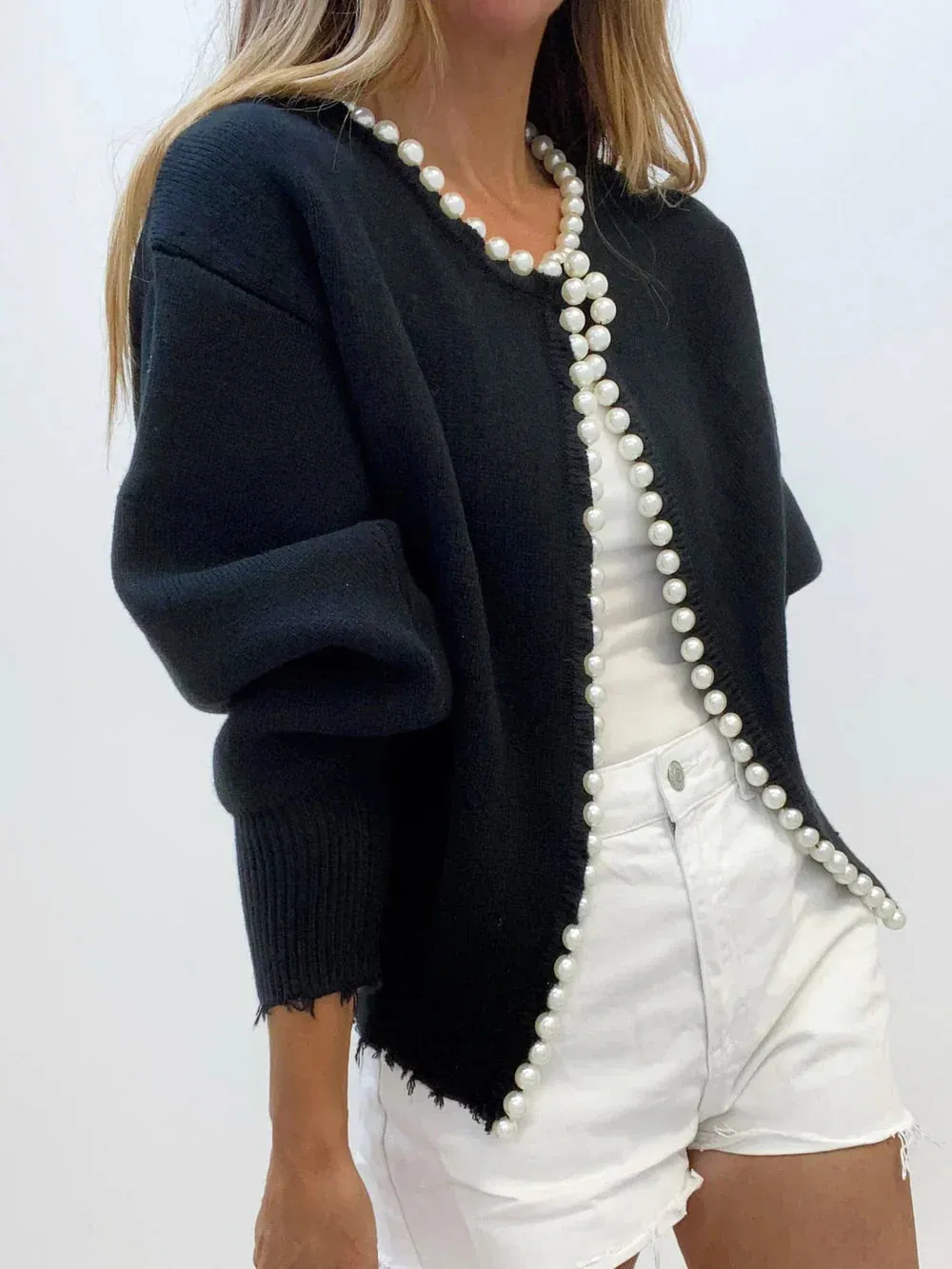Urania® | Luxurious vest with parel edge