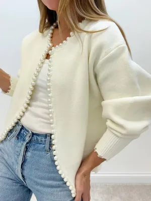 Urania® | Luxurious vest with parel edge