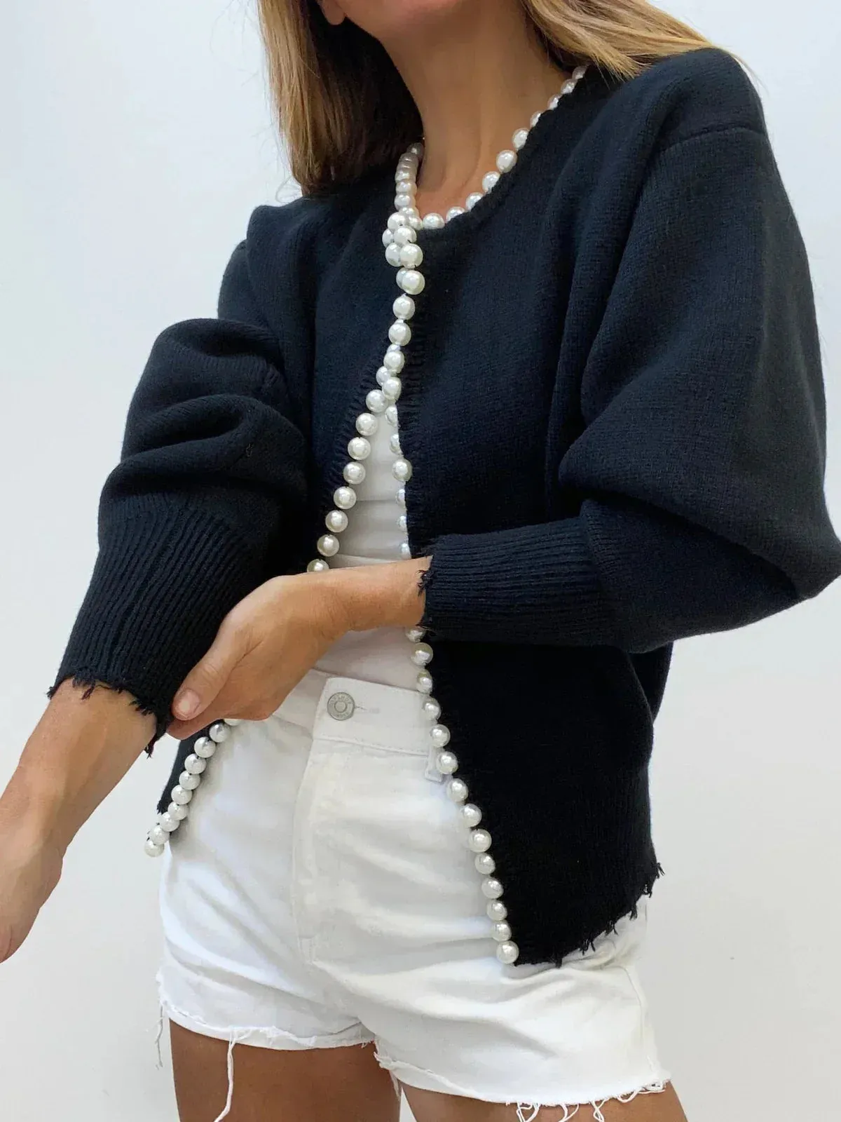 Urania® | Luxurious vest with parel edge